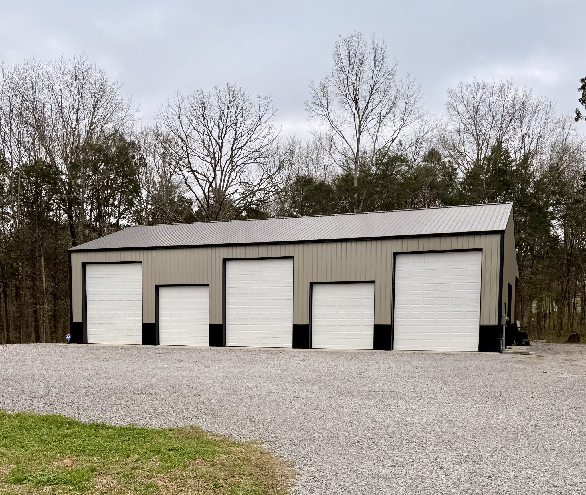 59 Huddleston Road Lascassas, TN 37085 - Photo 5 of 60 a view of a house with a yard and garage