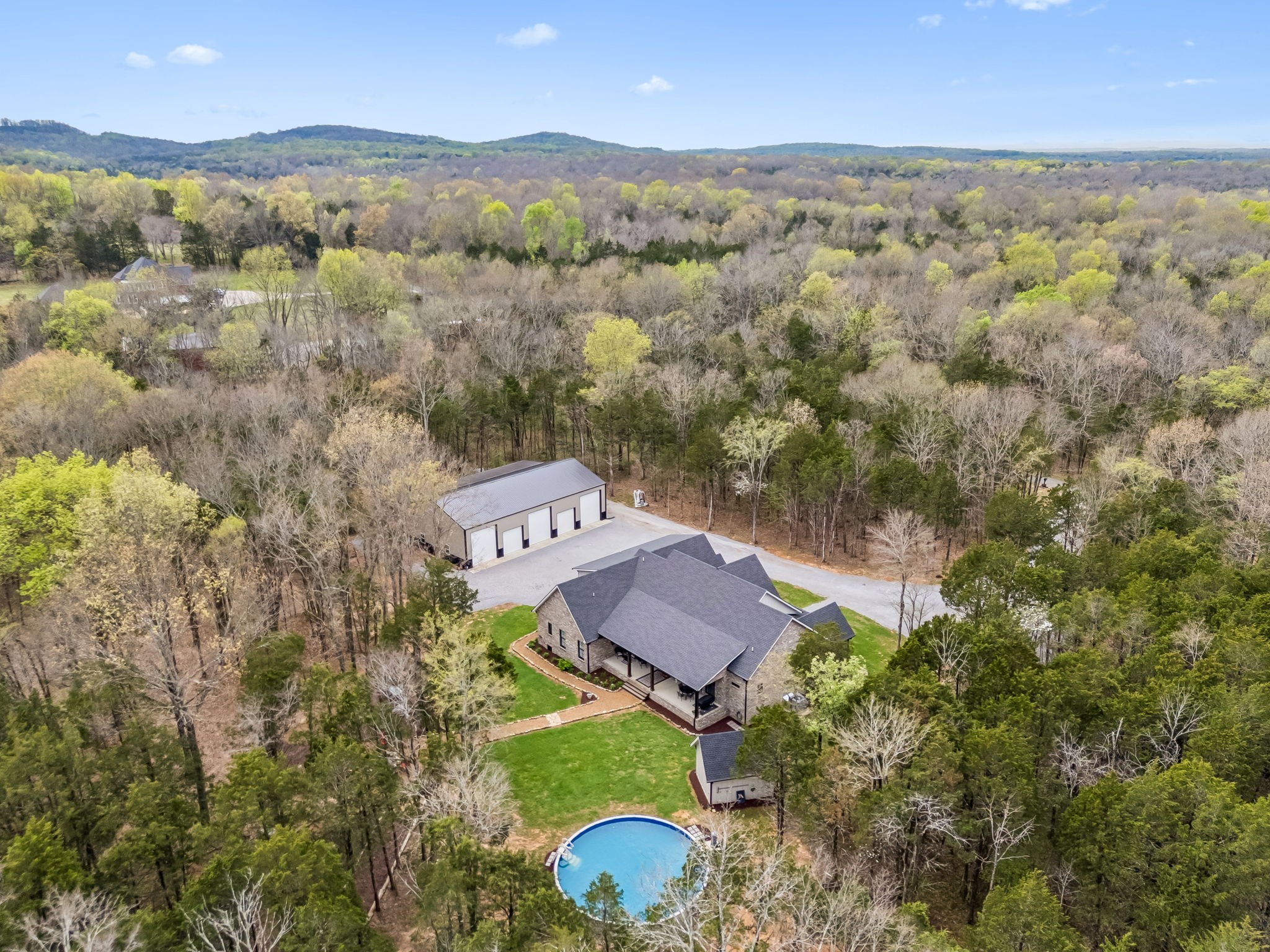 59 Huddleston Road Lascassas, TN 37085 - Photo 51 of 60 an aerial view of a house with a yard