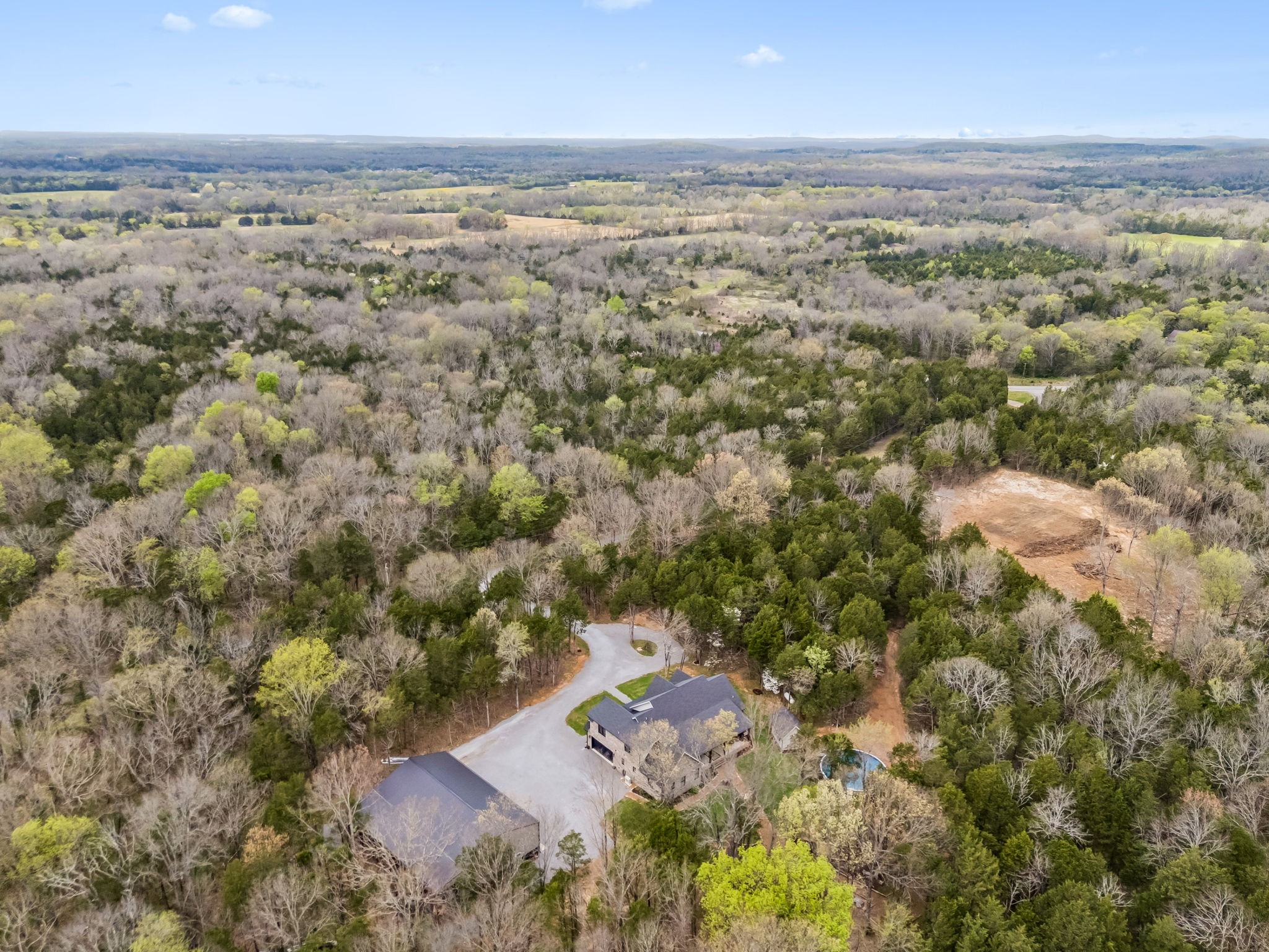 59 Huddleston Road Lascassas, TN 37085 - Photo 52 of 60 an aerial view of residential building with an outdoor space and seating