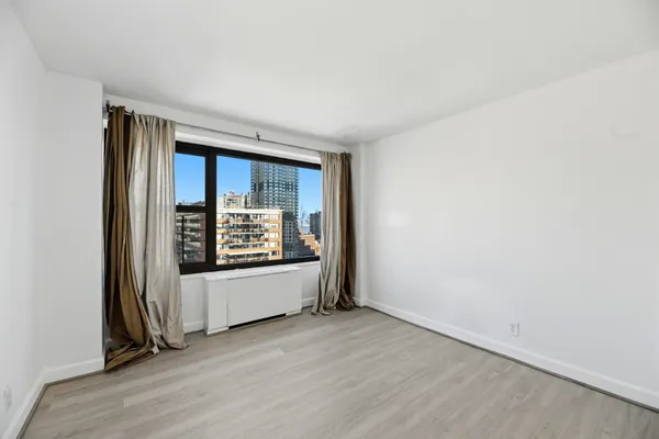 a view of small space with wooden floor
