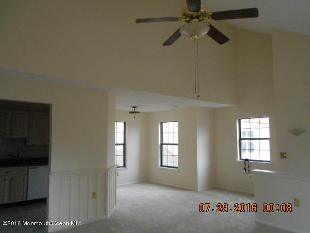 709 Ivy Court Jackson, NJ 08527 - Photo 8 of 8 a view of an empty room with a window