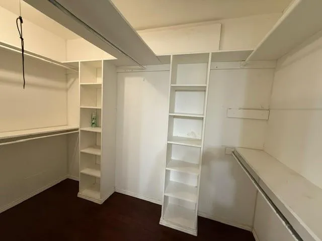 a view of a livingroom with wooden floor