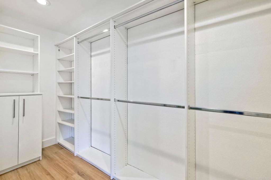 7165 Willet Circle Carlsbad, CA 92011 - Photo 26 of 65 a view of walk in closet with empty racks