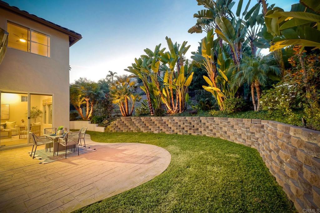 7165 Willet Circle Carlsbad, CA 92011 - Photo 3 of 65 a view of a swimming pool with an outdoor seating