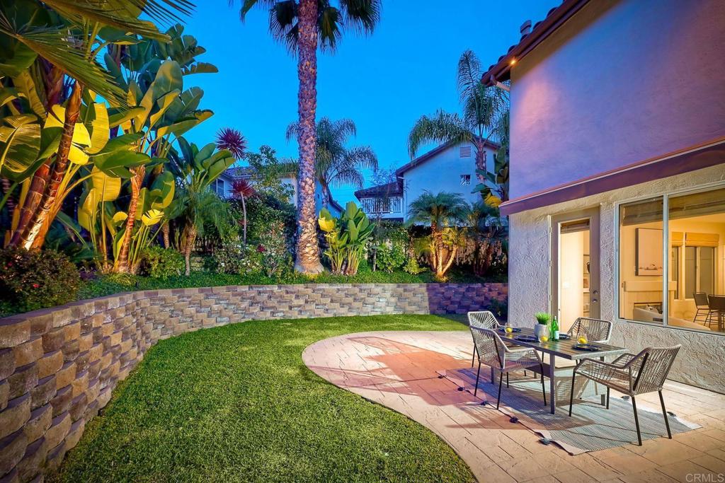 7165 Willet Circle Carlsbad, CA 92011 - Photo 40 of 65 a view of a backyard with a patio