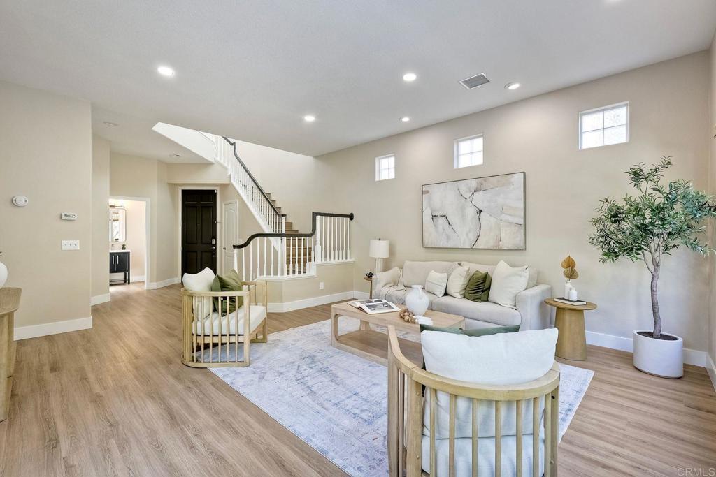 7165 Willet Circle Carlsbad, CA 92011 - Photo 4 of 65 a living room with furniture and a wooden floor