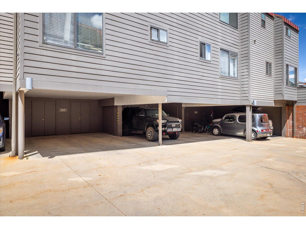 836 Walnut Street, Unit B Boulder, CO 80302 - Photo 27 of 36 Reserved carport outside of unit