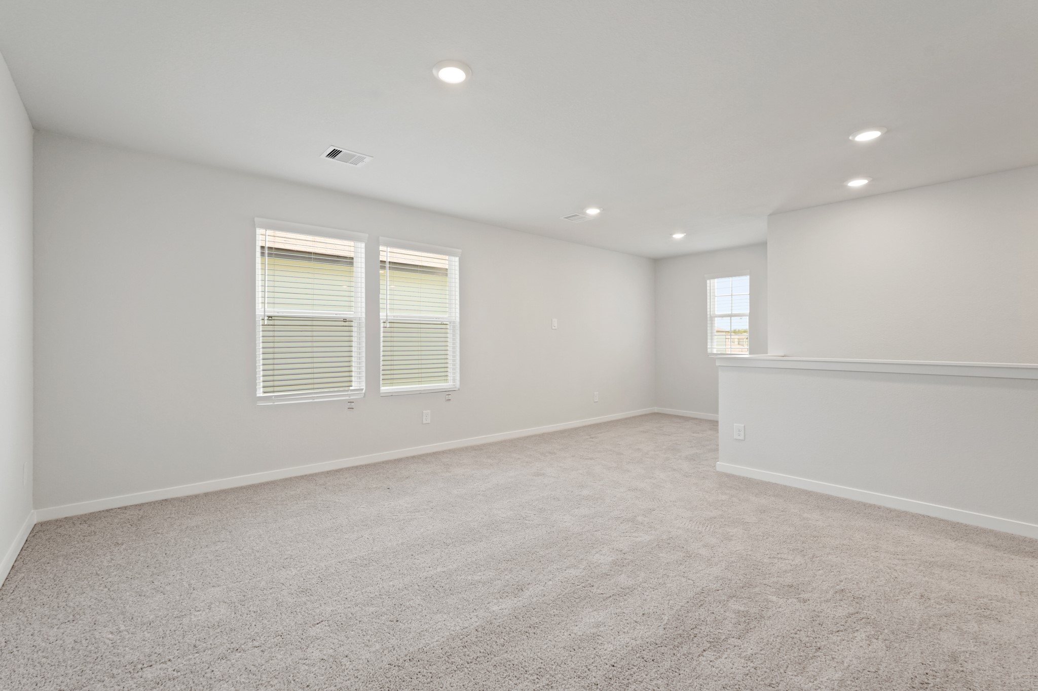 17202 King Eider Road Waller, TX 77484 - Photo 13 of 29 an empty room with windows