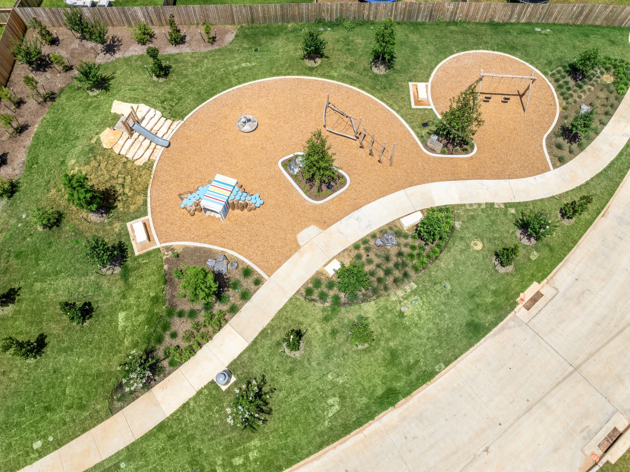 17202 King Eider Road Waller, TX 77484 - Photo 24 of 29 an aerial view of a house with a garden and a car parked side of the road