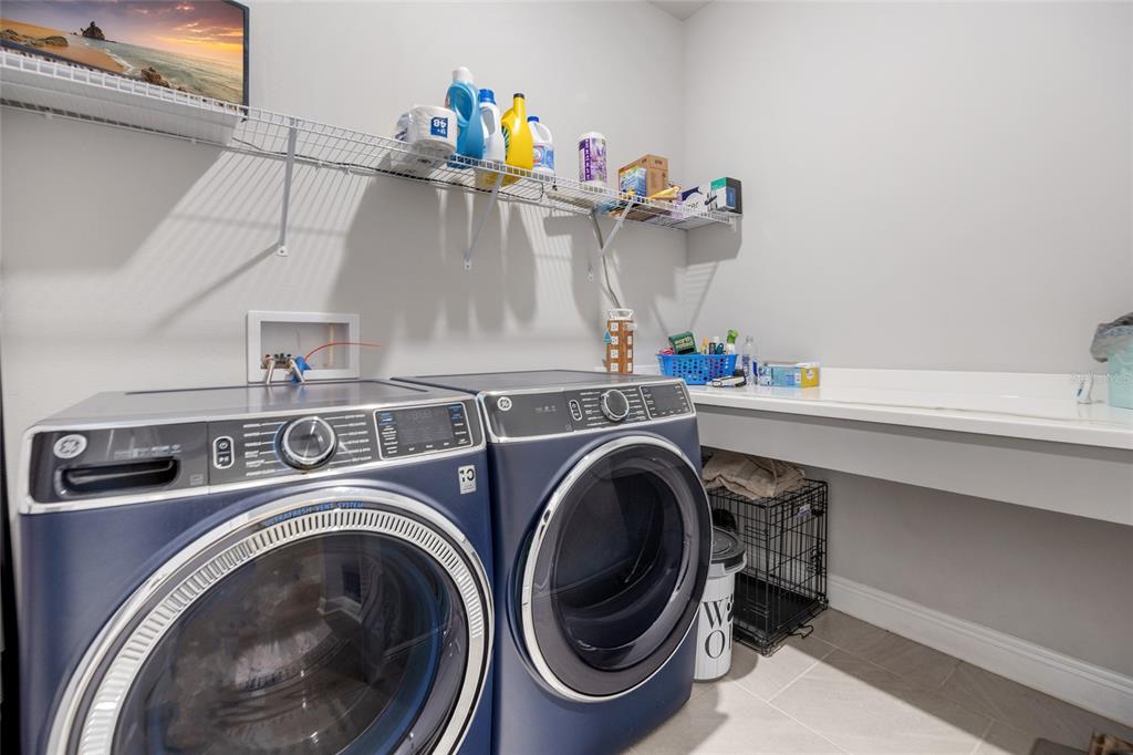 11720 Chevelon Lane Parrish, FL 34219 - Photo 23 of 70 a utility room with dryer and washer