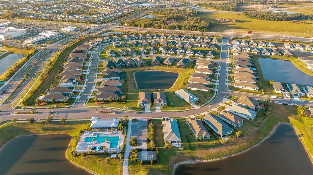11720 Chevelon Lane Parrish, FL 34219 - Photo 37 of 70 a view of swimming pool with a table and chairs
