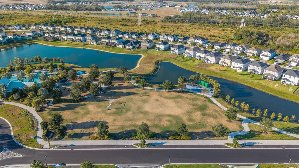 11720 Chevelon Lane Parrish, FL 34219 - Photo 51 of 70 an aerial view of a residential building with an ocean view
