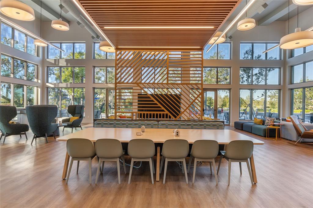 11720 Chevelon Lane Parrish, FL 34219 - Photo 54 of 70 a dining area with glass top table and chairs