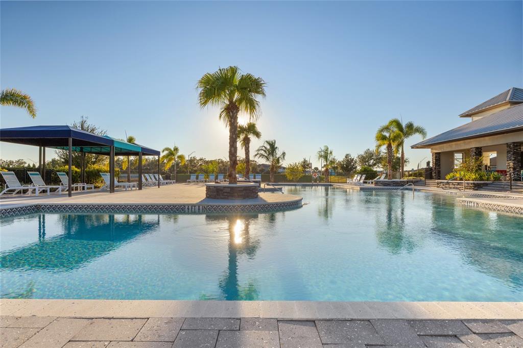 11720 Chevelon Lane Parrish, FL 34219 - Photo 63 of 70 a view of water with boats and palm trees