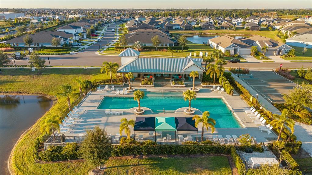 11720 Chevelon Lane Parrish, FL 34219 - Photo 66 of 70 an aerial view of residential houses with outdoor space