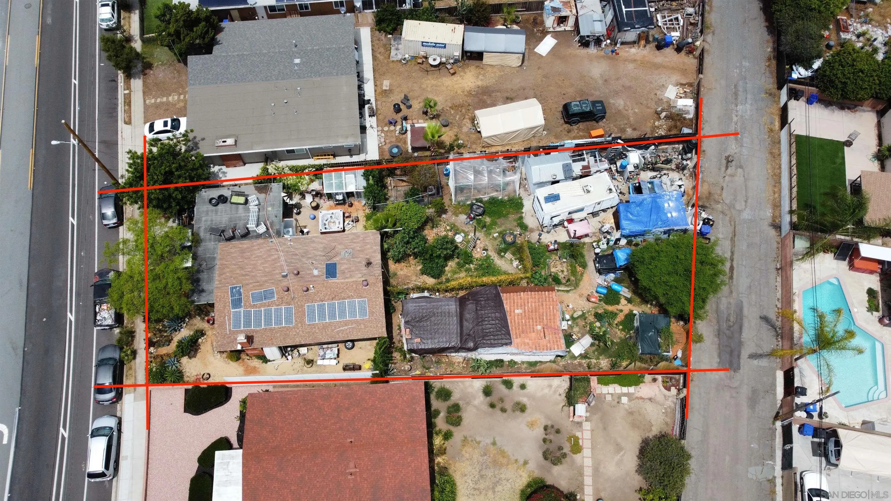 3031 Murray Ridge Road San Diego, CA 92123 - Photo 7 of 9 an aerial view of a houses with outdoor space