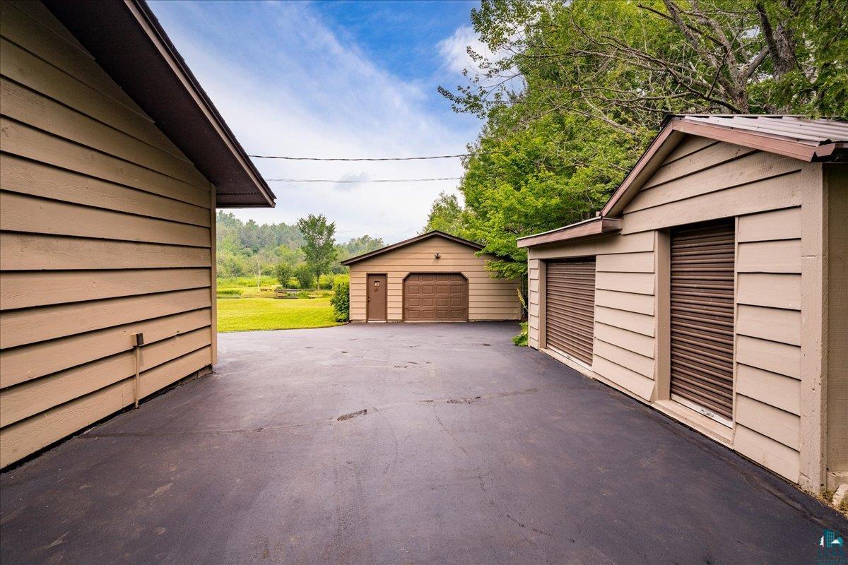 5195 Lavaque Junction Road Hermantown, MN 55811 - Photo 41 of 66 Expansive paved driveway offering access to multiple storage buildings