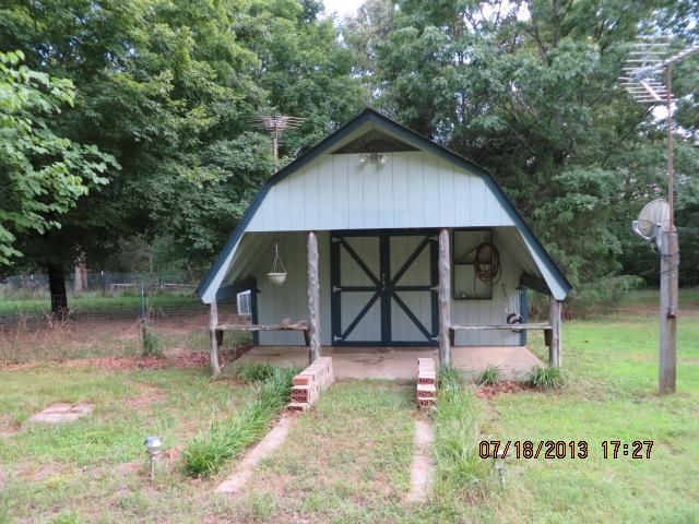 7737 Pinewood Road Primm Springs, TN 38476 - Photo 3 of 13 a view of backyard with green space