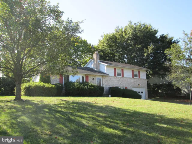a view of a house with a swimming pool
