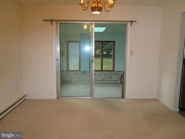 wooden floor and window in a room