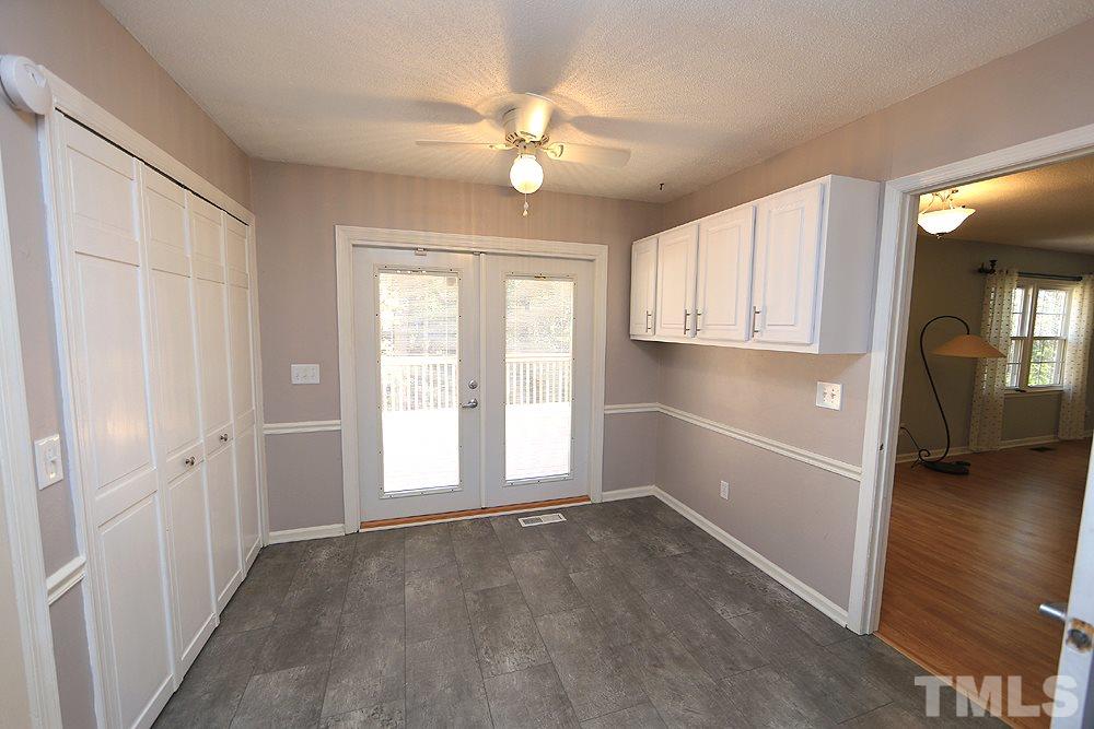 6628 Keystone Drive Raleigh, NC 27612 - Photo 12 of 28 Cabinets were added to the breakfast area. There is chair molding. If you don't need two dining spaces, I could see a great coffee/tea bar in the area.