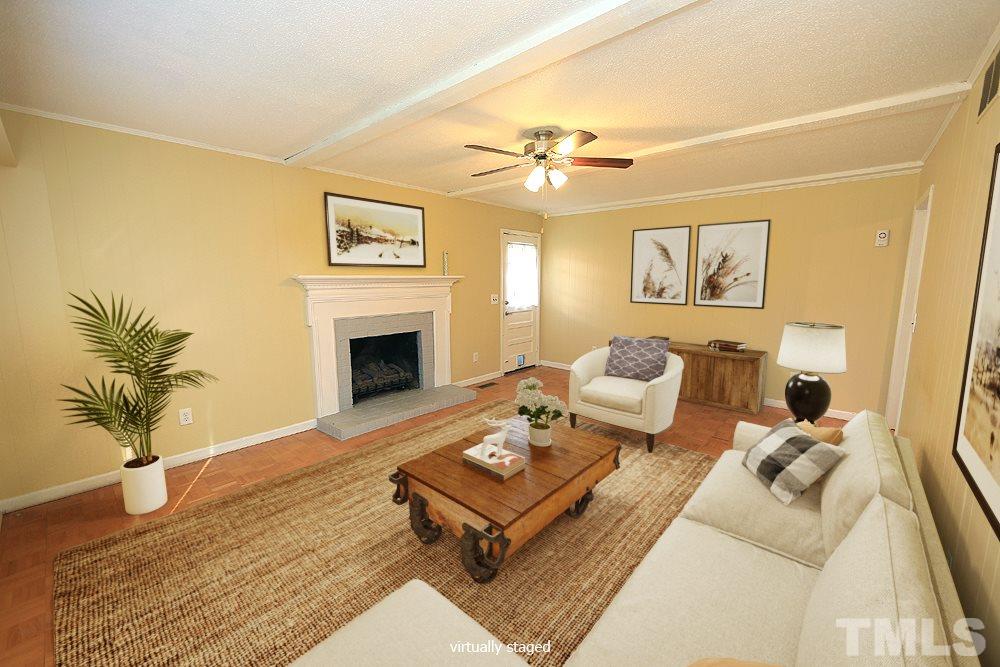6628 Keystone Drive Raleigh, NC 27612 - Photo 15 of 28 What a great space and so many options for furniture placement.