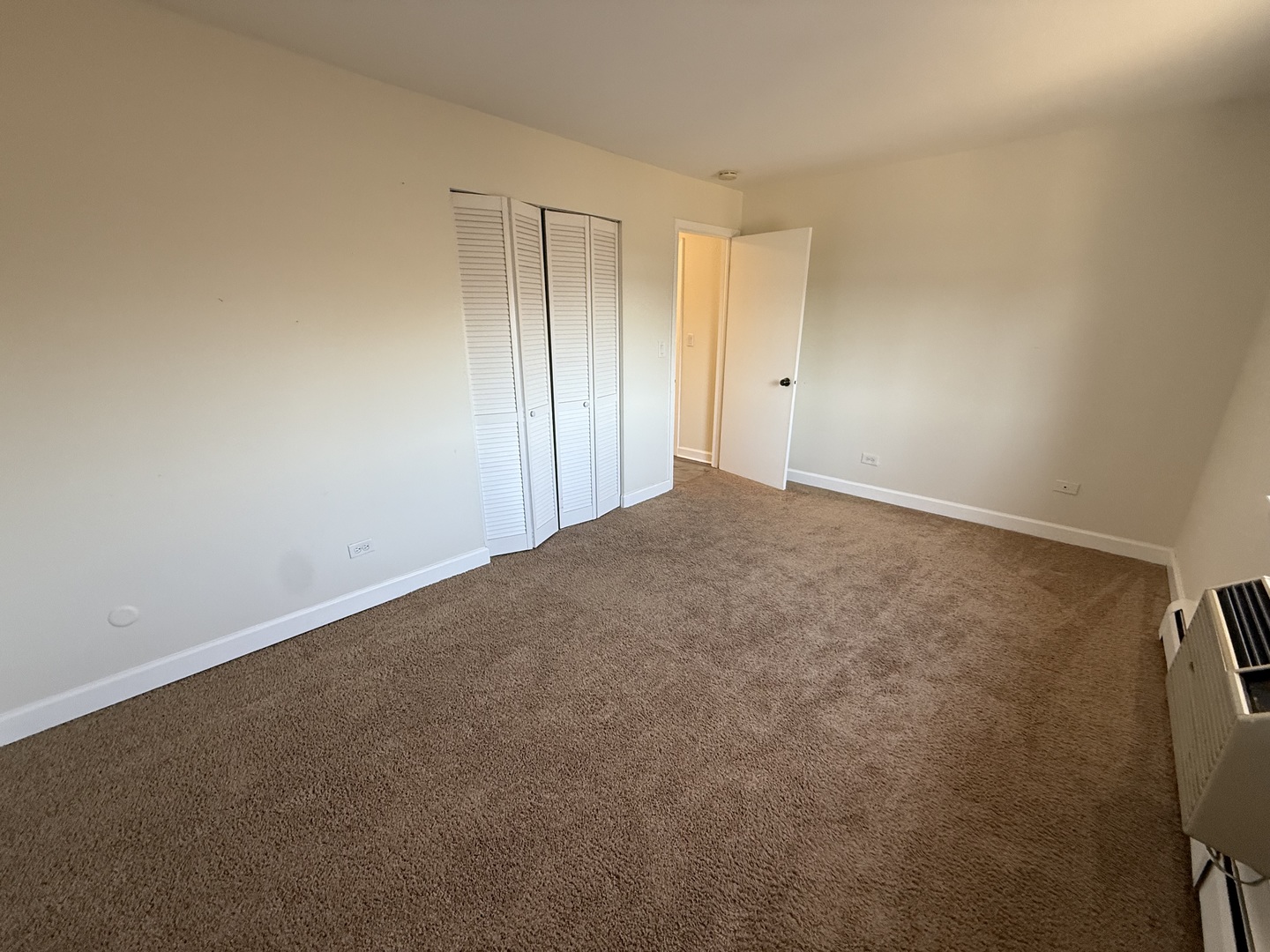 1039 College Avenue, Unit 10E Wheaton, IL 60187 - Photo 11 of 16 a view of an empty room