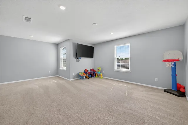 a view of a livingroom with a flat screen tv