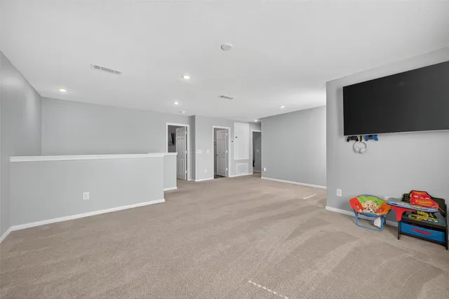 a view of a livingroom with furniture