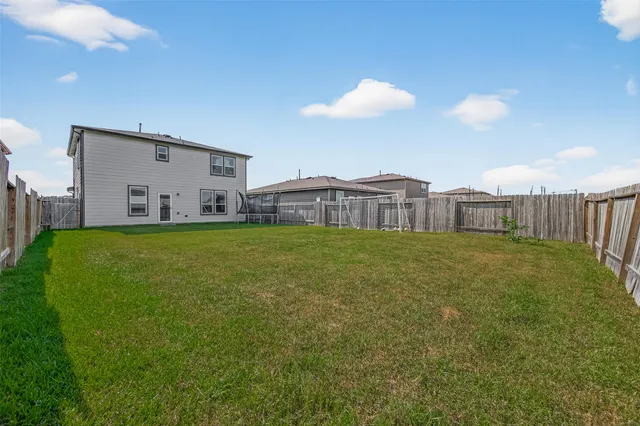 a house view with a garden space