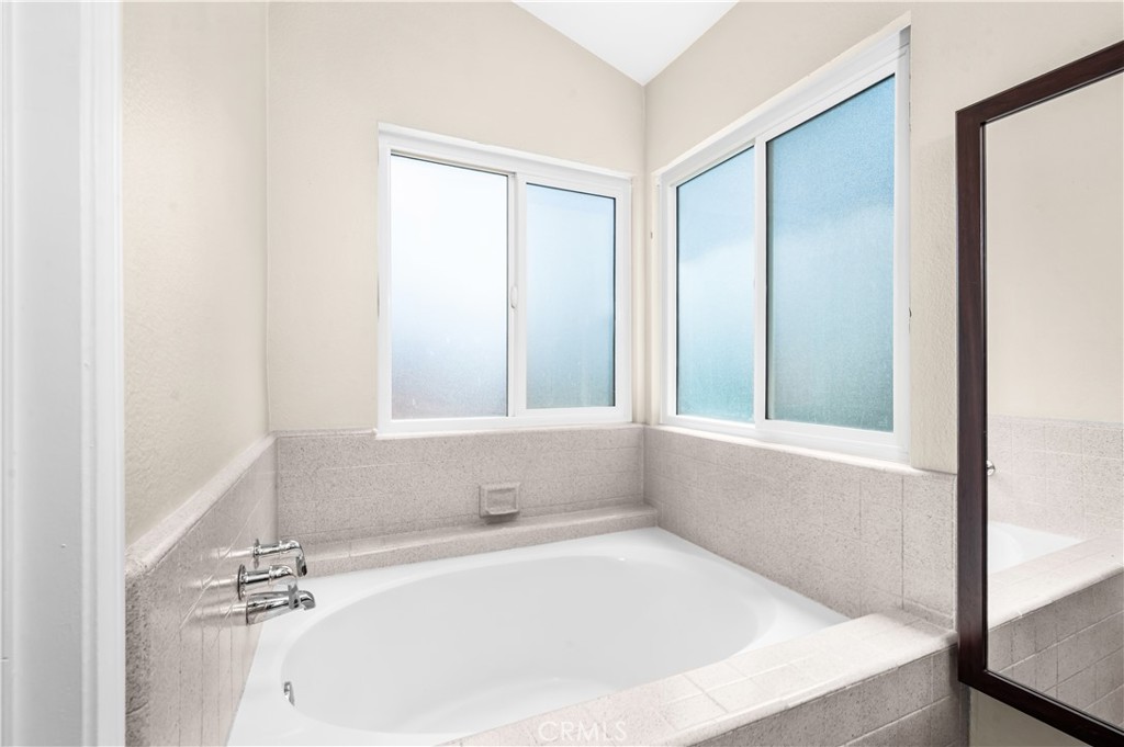 19465 Kinnow Lane Riverside, CA 92508 - Photo 27 of 61 a white bath tub sitting in a bathroom