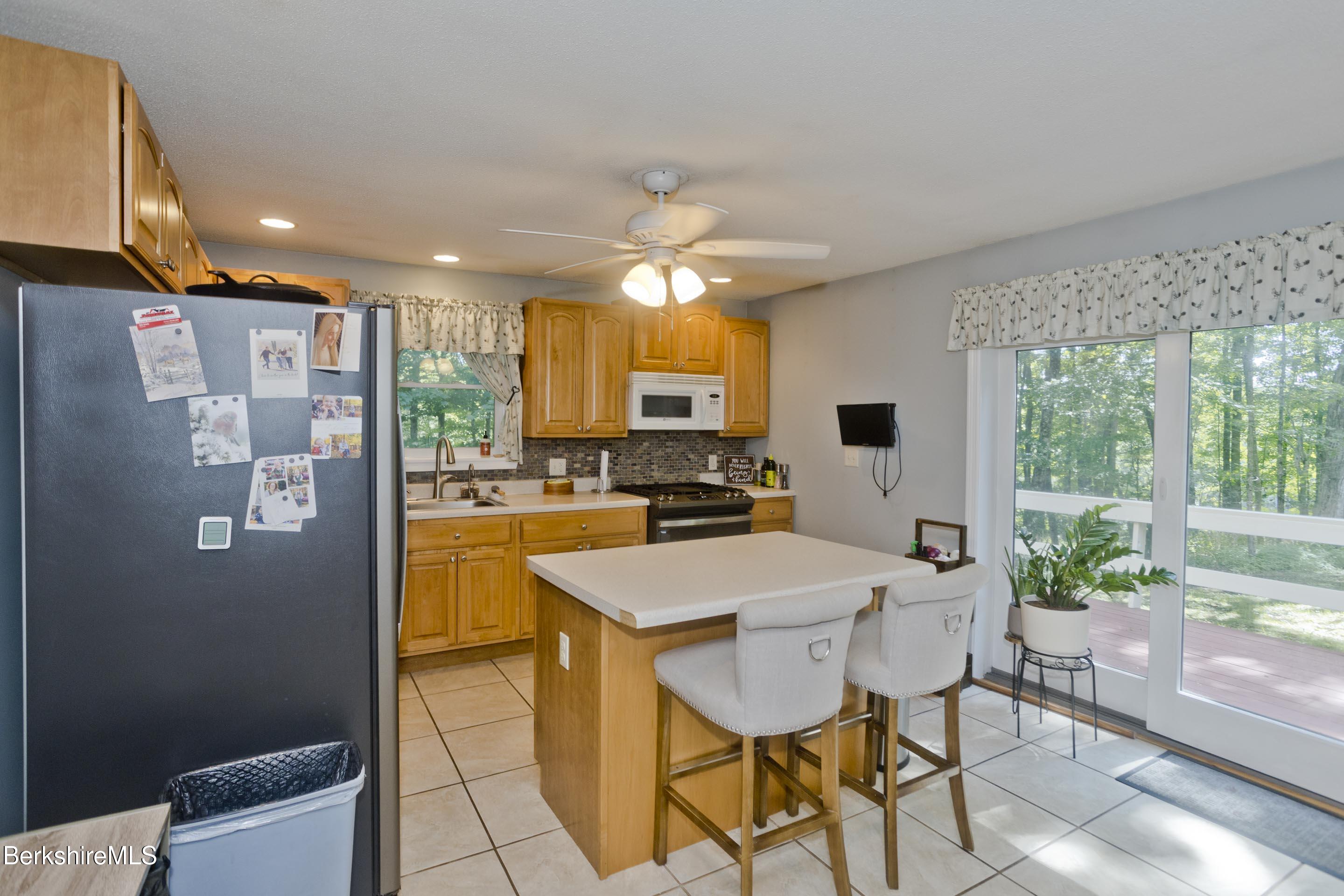 2305 Jacobs Ladder Road Becket, MA 01223 - Photo 8 of 25 Kitchen with deck access