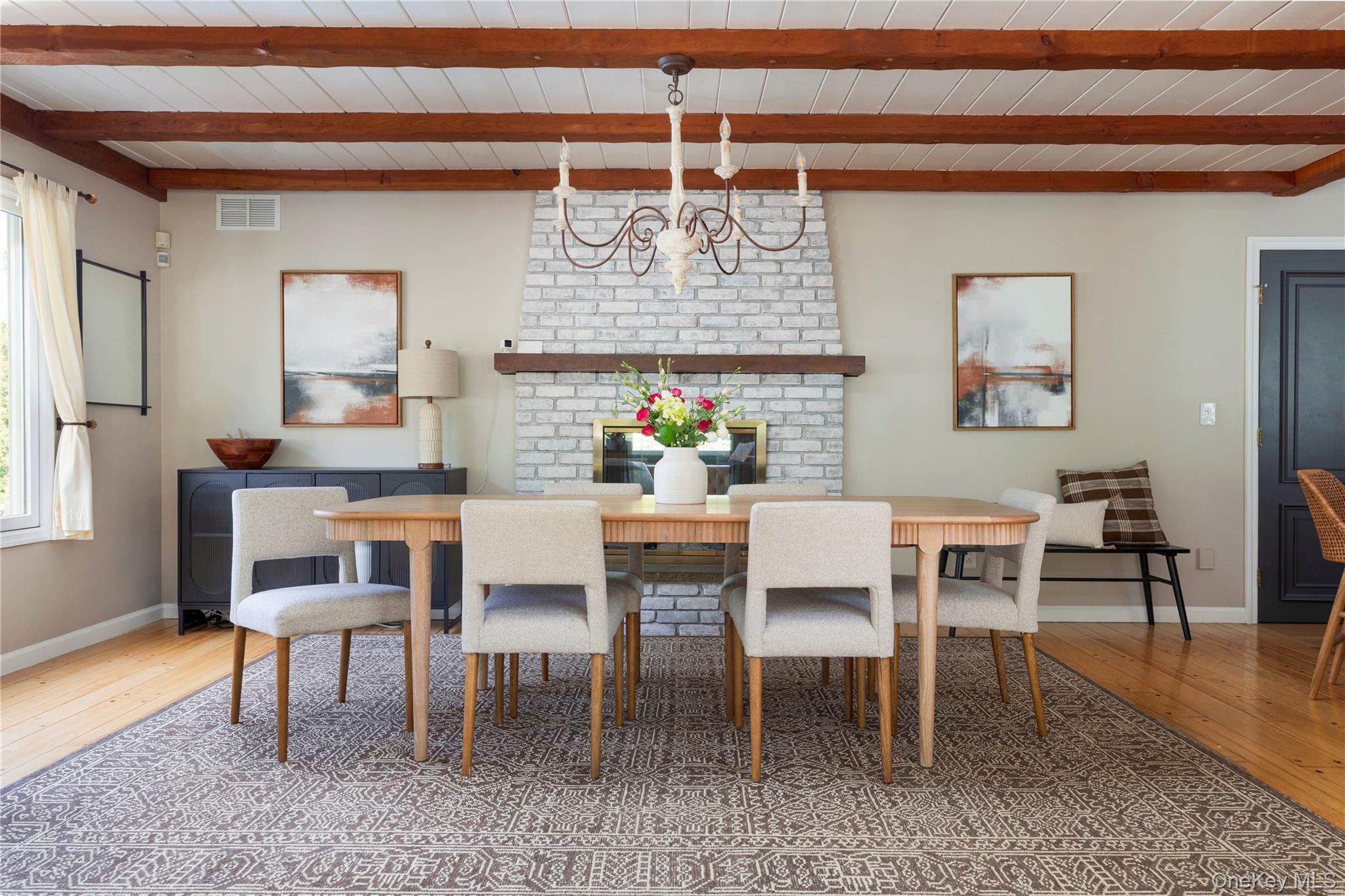 135 Turk Hill Road Brewster, NY 10509 - Photo 11 of 42 a view of a dining room with furniture and wooden floor