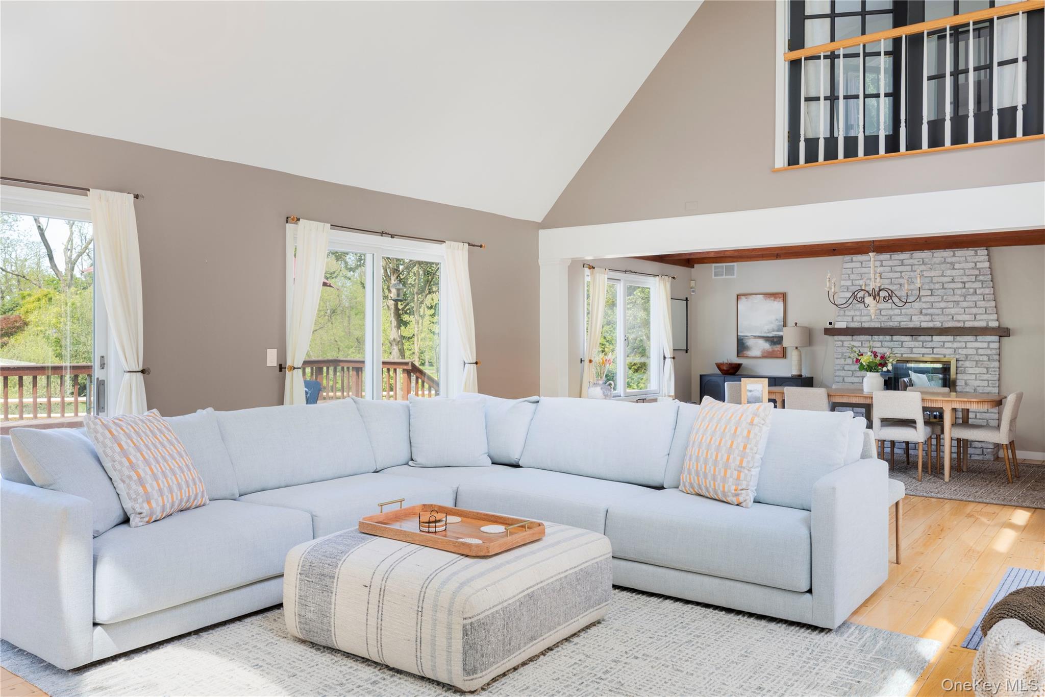 135 Turk Hill Road Brewster, NY 10509 - Photo 14 of 42 a living room with furniture and a large window