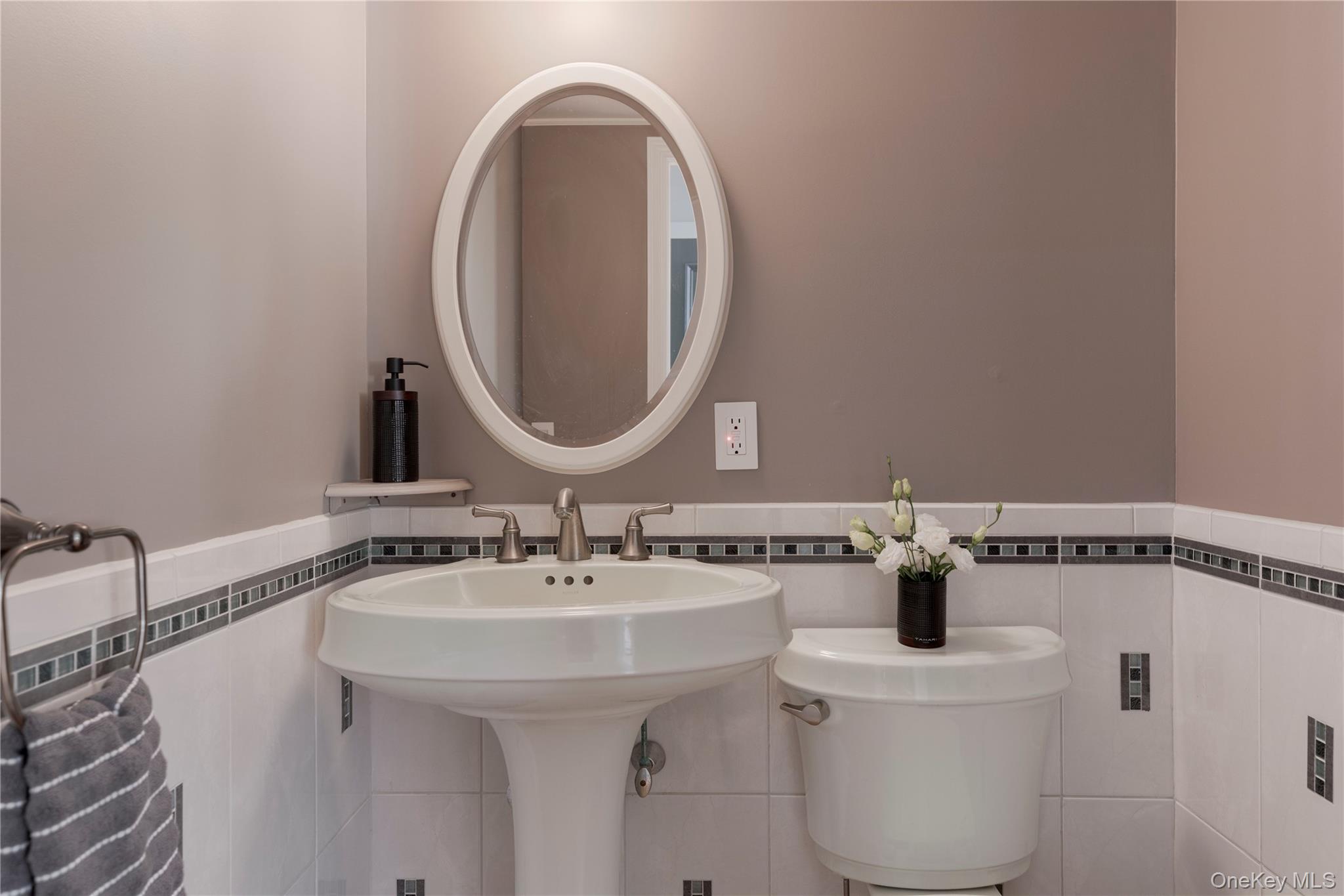 135 Turk Hill Road Brewster, NY 10509 - Photo 20 of 42 a bathroom with a sink and a mirror