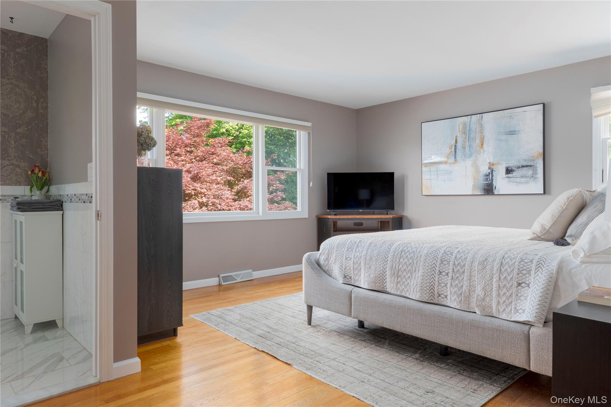 135 Turk Hill Road Brewster, NY 10509 - Photo 21 of 42 a bedroom with a bed and a window