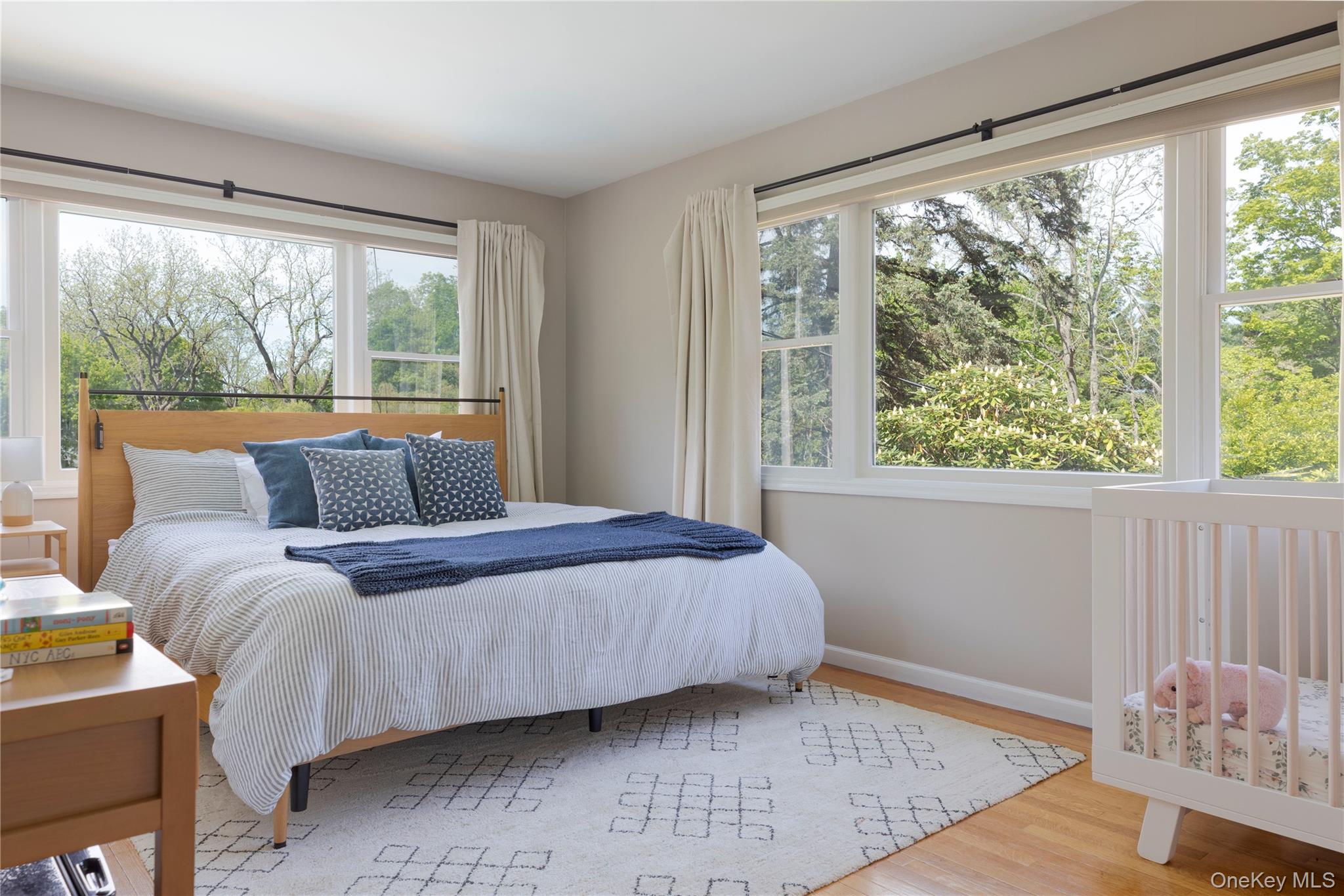 135 Turk Hill Road Brewster, NY 10509 - Photo 27 of 42 a bedroom with a bed and a large window