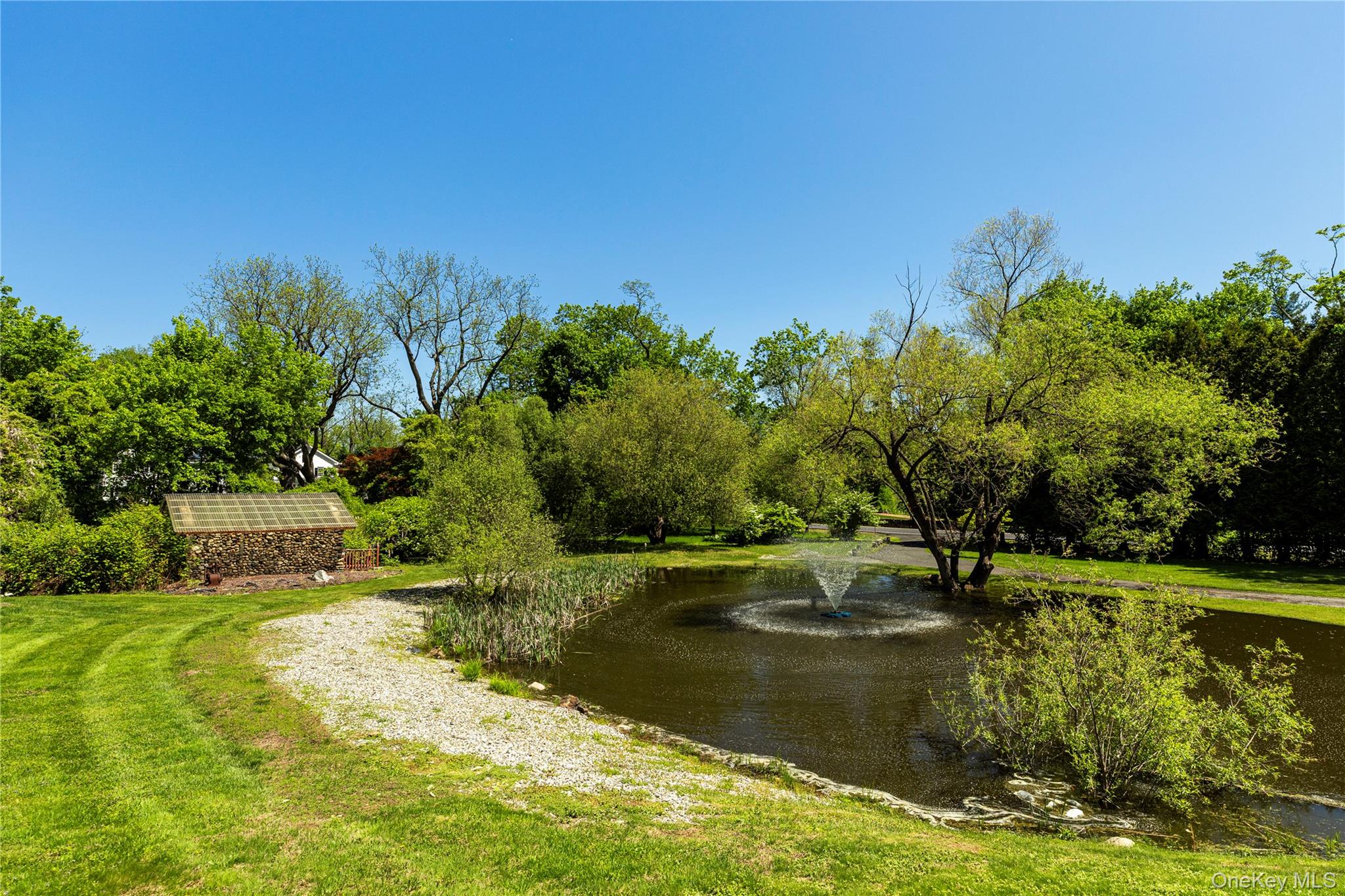 135 Turk Hill Road Brewster, NY 10509 - Photo 41 of 42 a view of a lake with houses
