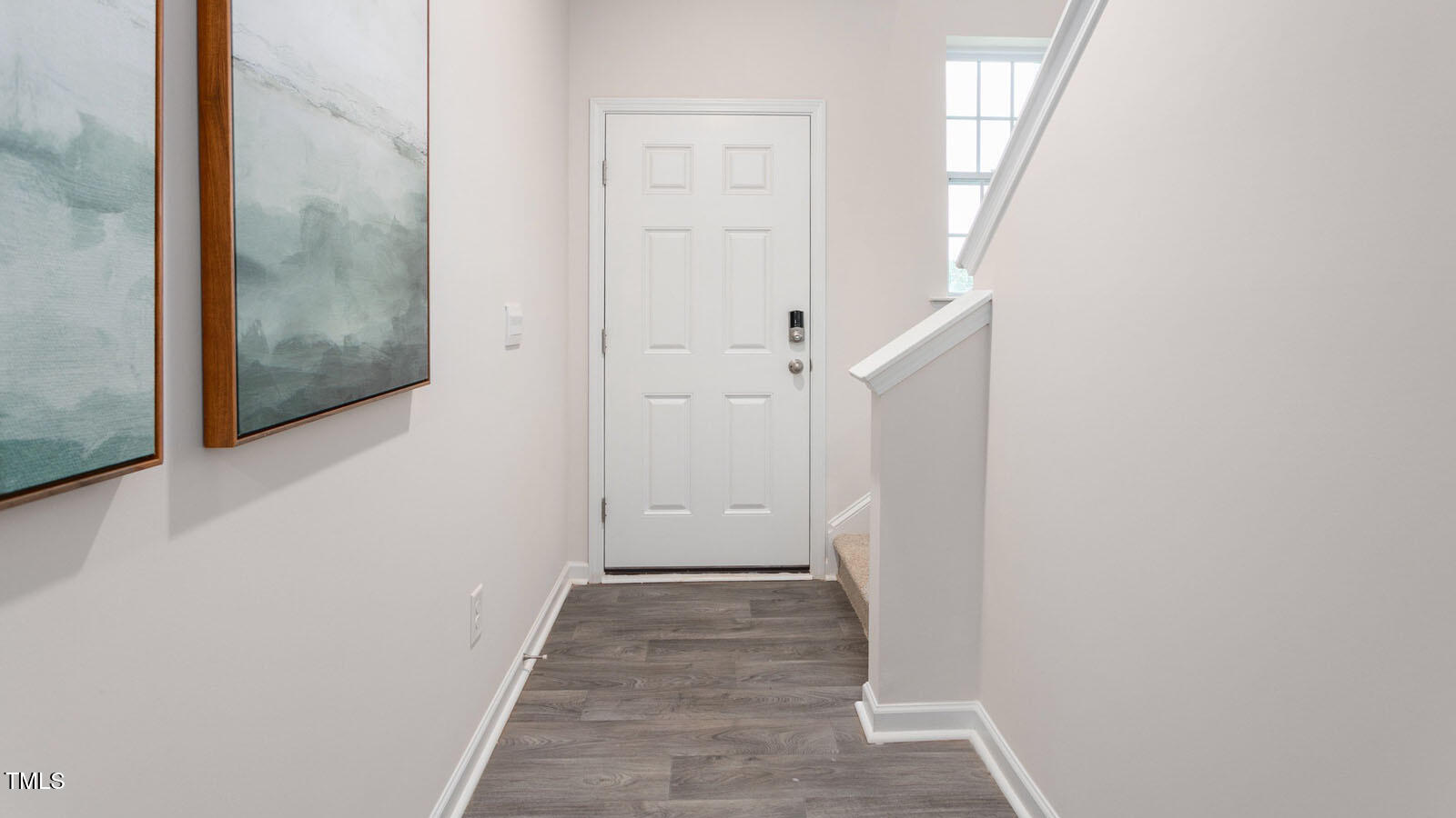 219 Perseus Street Angier, NC 27501 - Photo 2 of 27 a view of a hallway with wooden floor and entryway