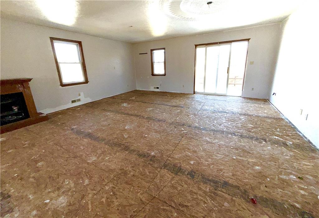 283 Line Street Central City, PA 15926 - Photo 4 of 11 an empty room with windows