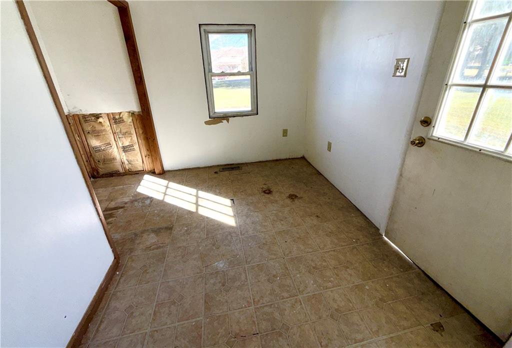 283 Line Street Central City, PA 15926 - Photo 8 of 11 a view of an empty room with windows