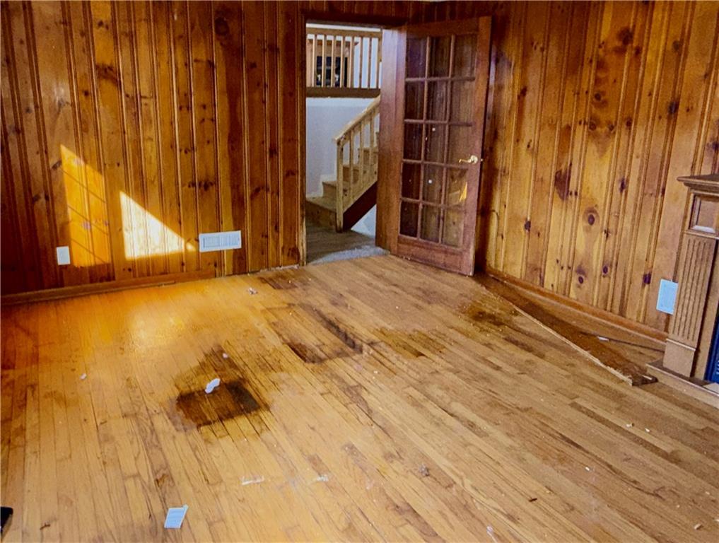 283 Line Street Central City, PA 15926 - Photo 9 of 11 a view of an empty room with wooden floor and a window
