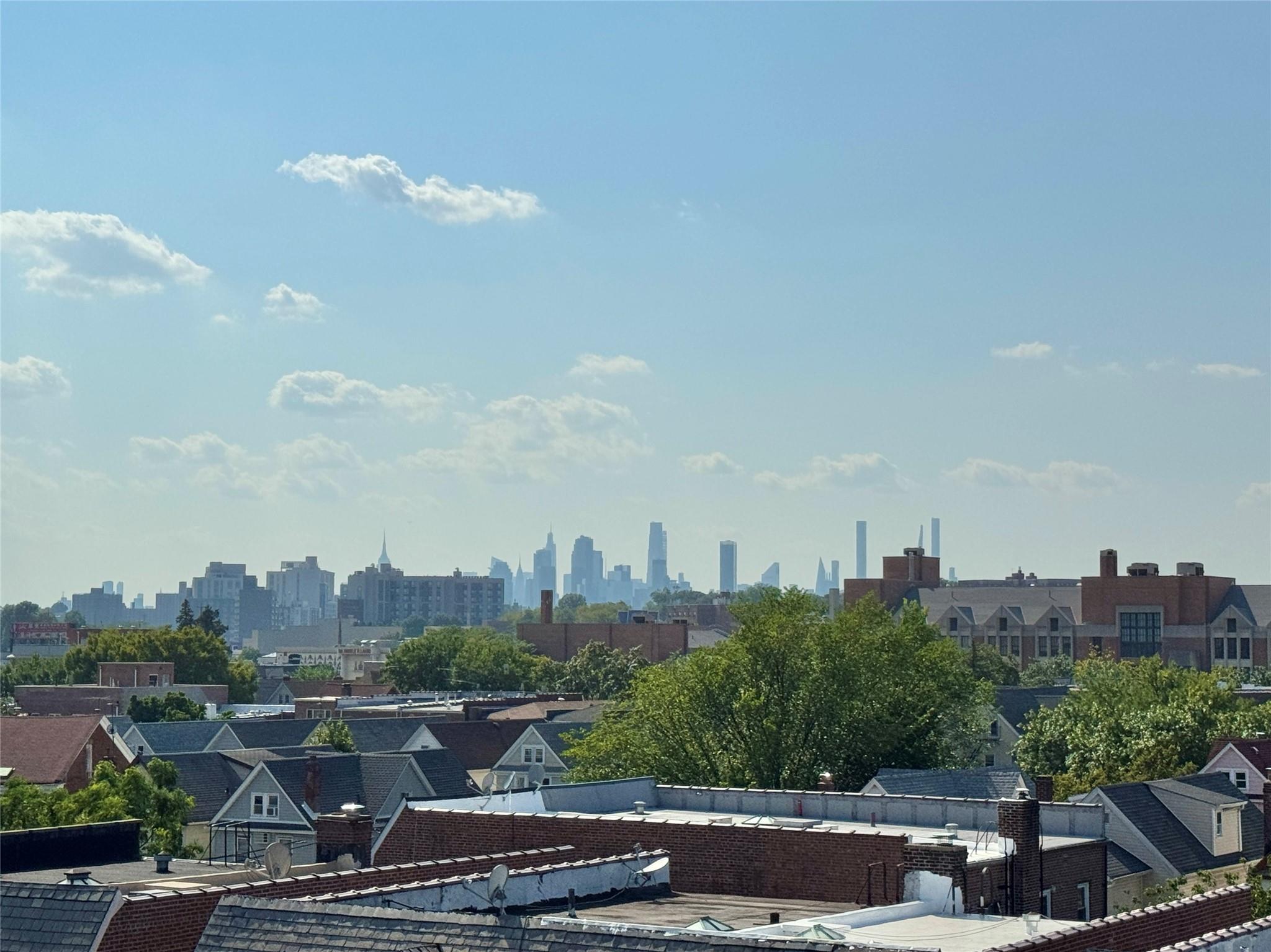 84-19 51st Avenue, Unit 5E Queens, NY 11373 - Photo 7 of 8 a view of a city