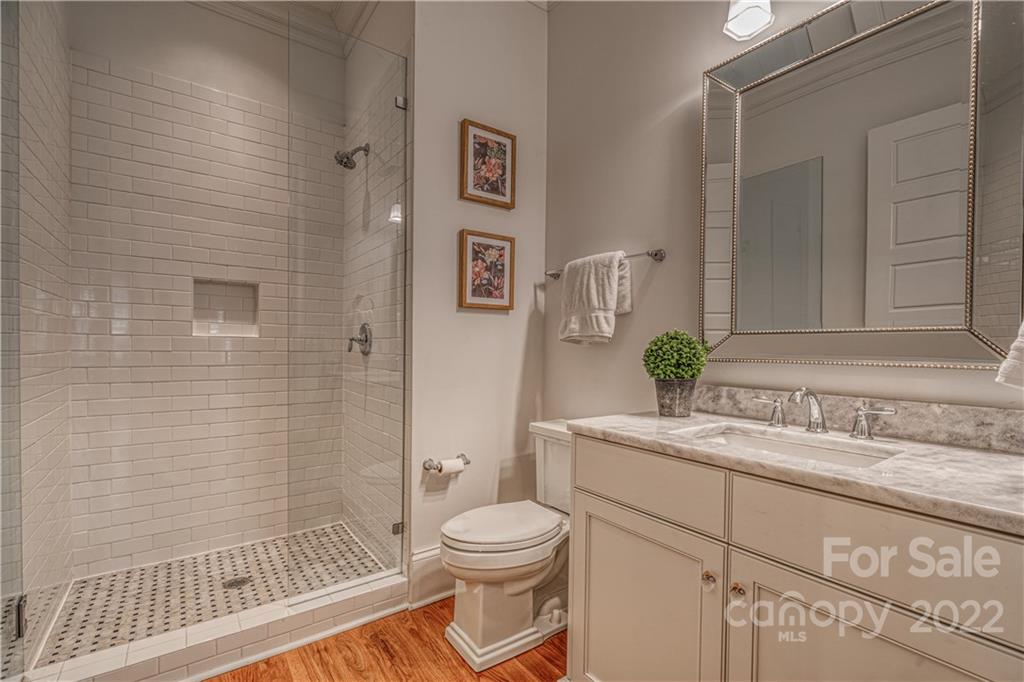 4026 Country Overlook Drive Fort Mill, SC 29715 - Photo 11 of 43 a bathroom with a sink a toilet and shower