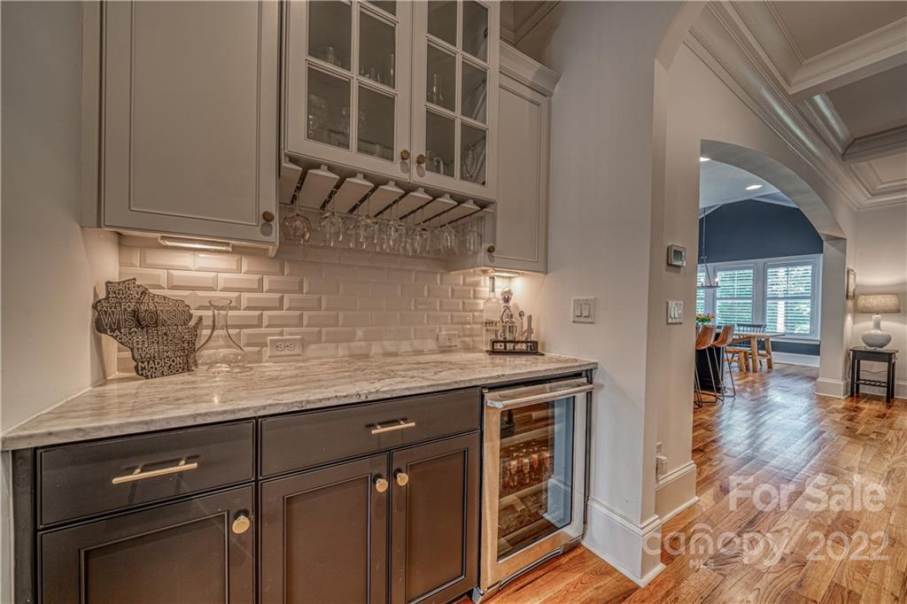 4026 Country Overlook Drive Fort Mill, SC 29715 - Photo 24 of 43 a kitchen with stainless steel appliances granite countertop a sink a stove and cabinets