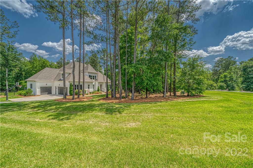 4026 Country Overlook Drive Fort Mill, SC 29715 - Photo 3 of 43 a view of a house with a big yard