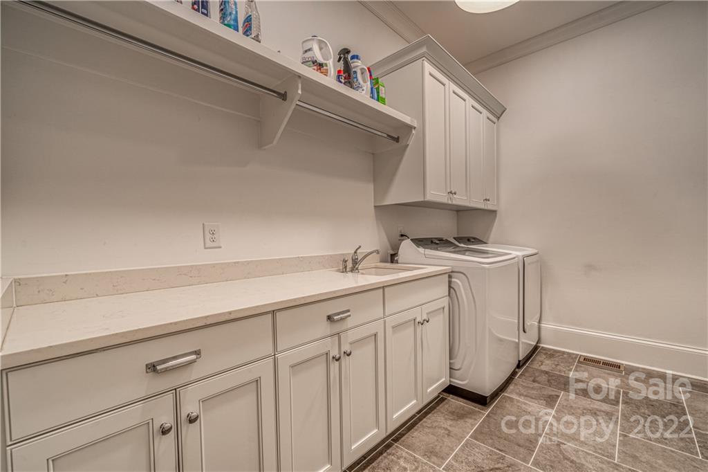 4026 Country Overlook Drive Fort Mill, SC 29715 - Photo 35 of 43 a utility room with cabinets