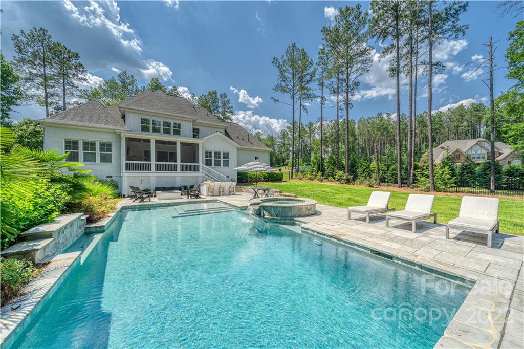 4026 Country Overlook Drive Fort Mill, SC 29715 - Photo 40 of 43 a view of a house with swimming pool and sitting area