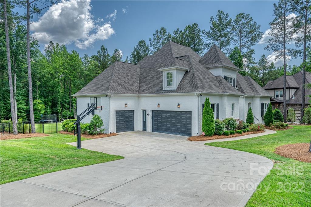 4026 Country Overlook Drive Fort Mill, SC 29715 - Photo 4 of 43 a front view of house with yard and green space