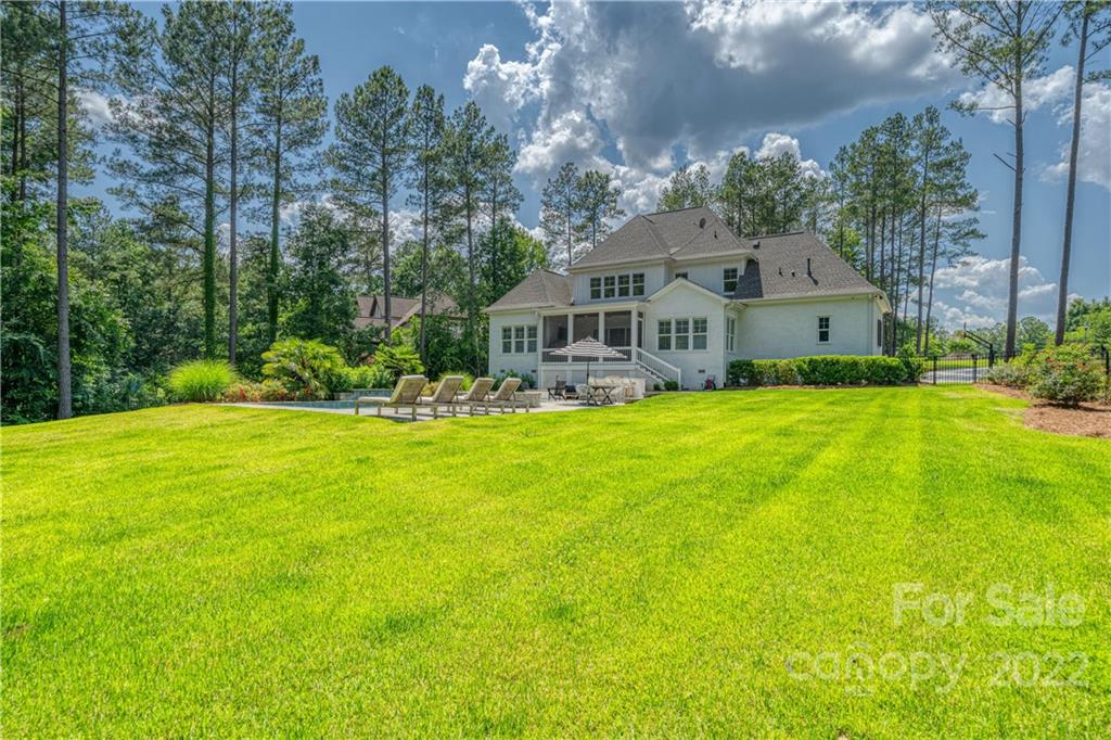 4026 Country Overlook Drive Fort Mill, SC 29715 - Photo 41 of 43 a front view of a house with a yard table and chairs